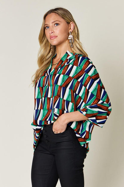 Geometric Notched Dolman Sleeve Top