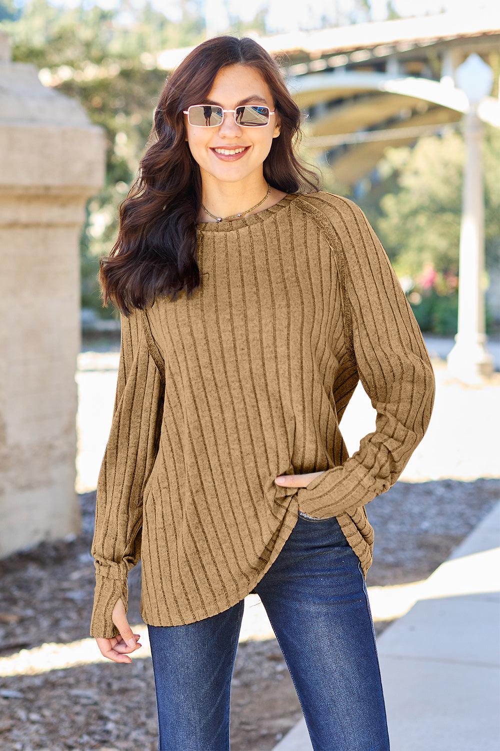 Ribbed knit top with round neck and long sleeves