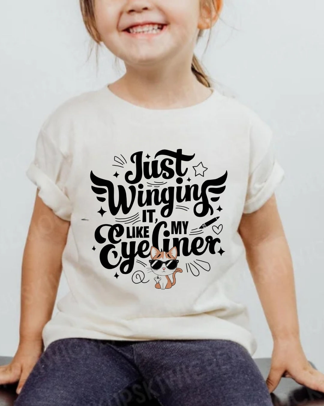 Just Winging it Like My Eyeliner Heavy Cotton T-Shirt