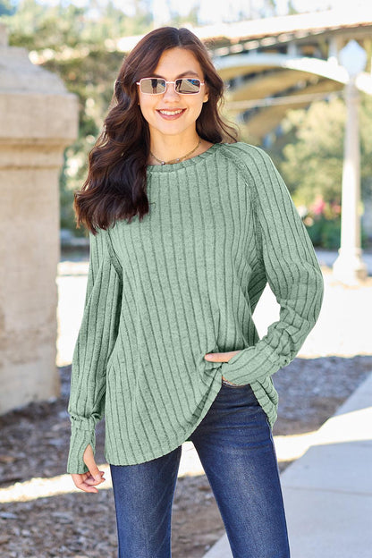 Ribbed knit top with round neck and long sleeves