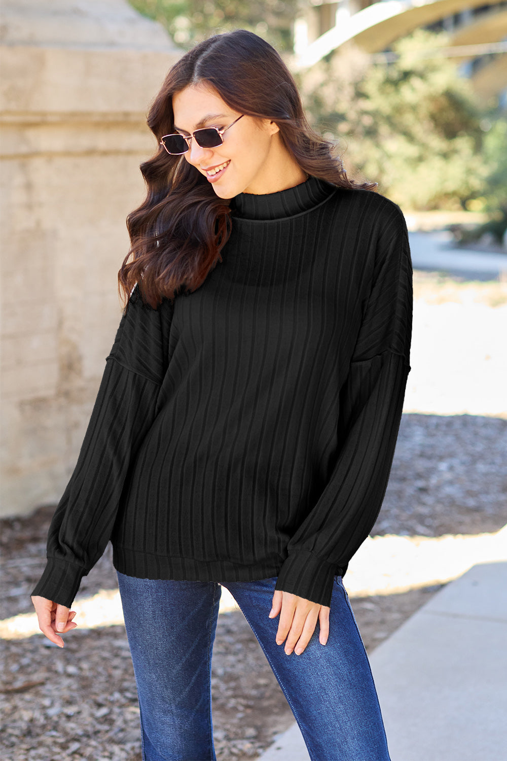 Ribbed knit top has a Mock Neck