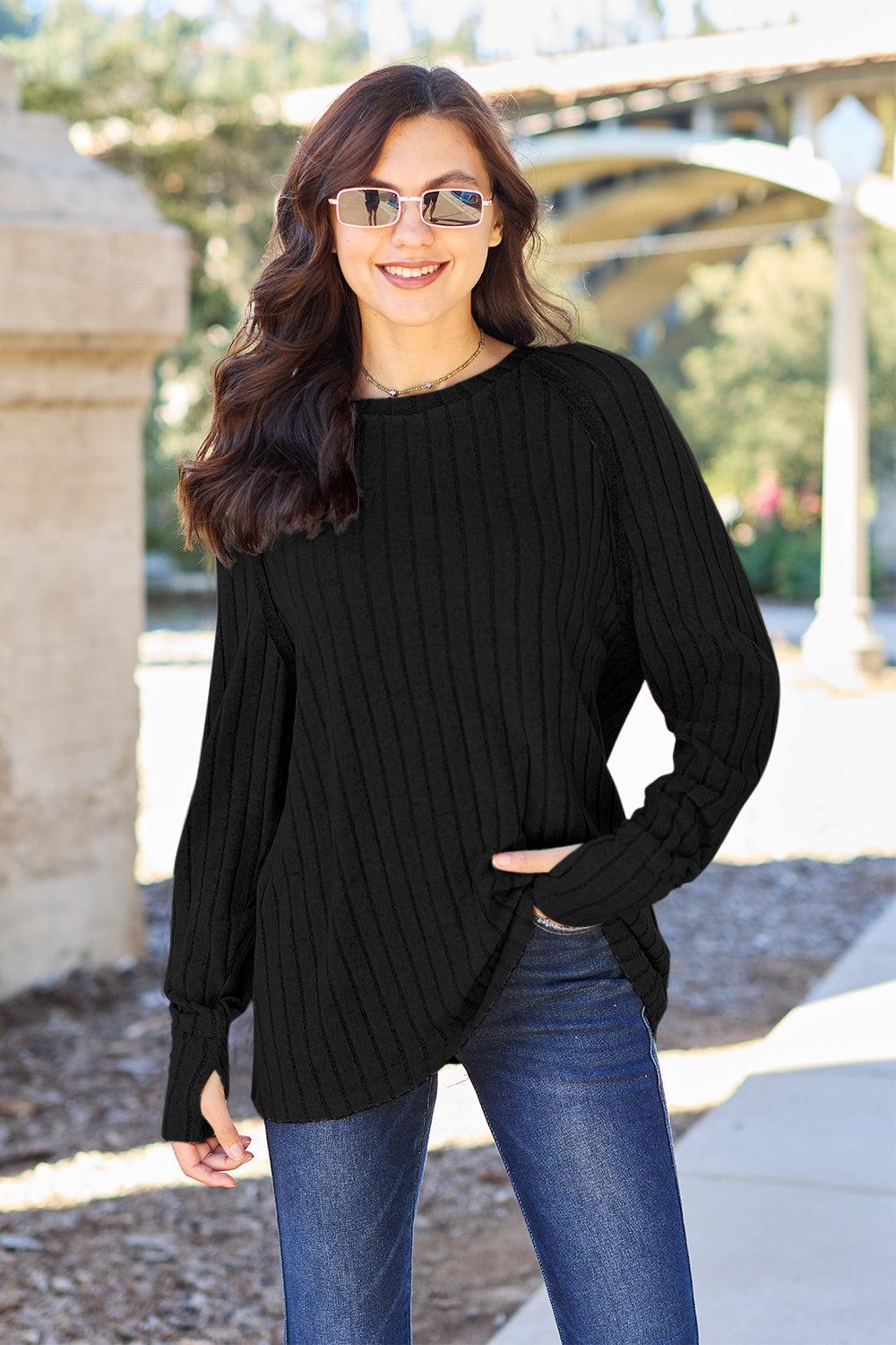 Ribbed knit top with round neck and long sleeves