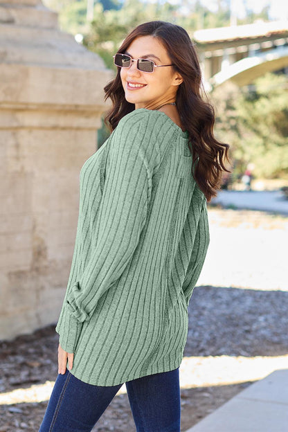 Ribbed knit top with round neck and long sleeves