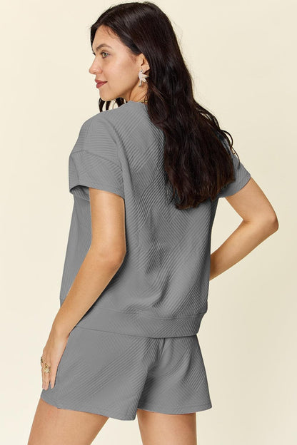 Textured short-sleeve t-shirt and drawstring shorts.