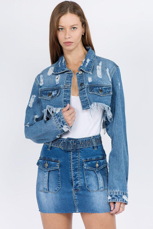 Distressed denim jacket with a frayed hem