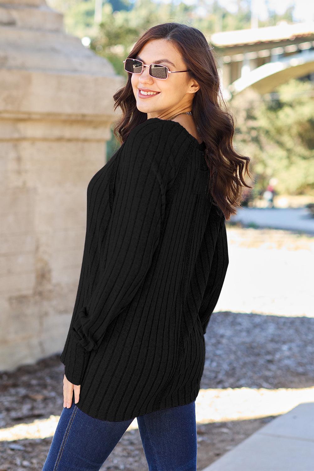 Ribbed knit top with round neck and long sleeves