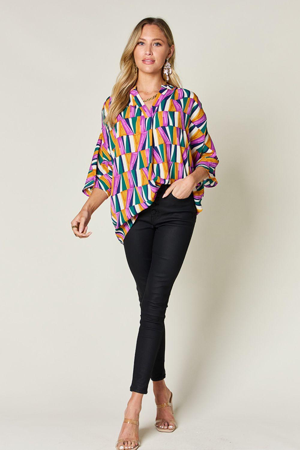 Geometric Notched Dolman Sleeve Top