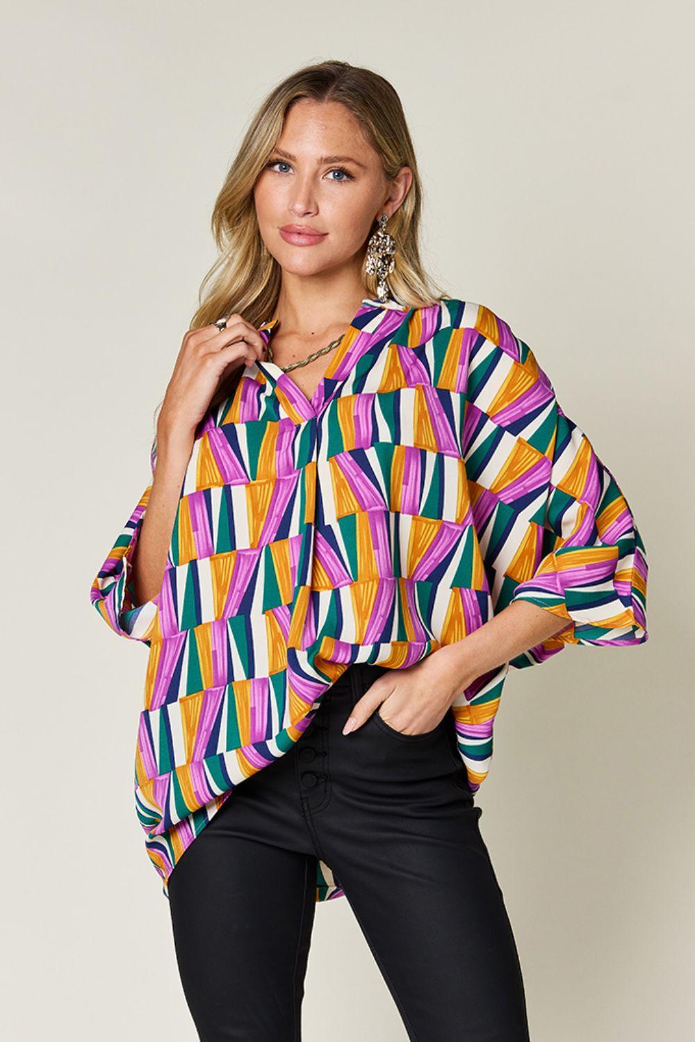 Geometric Notched Dolman Sleeve Top