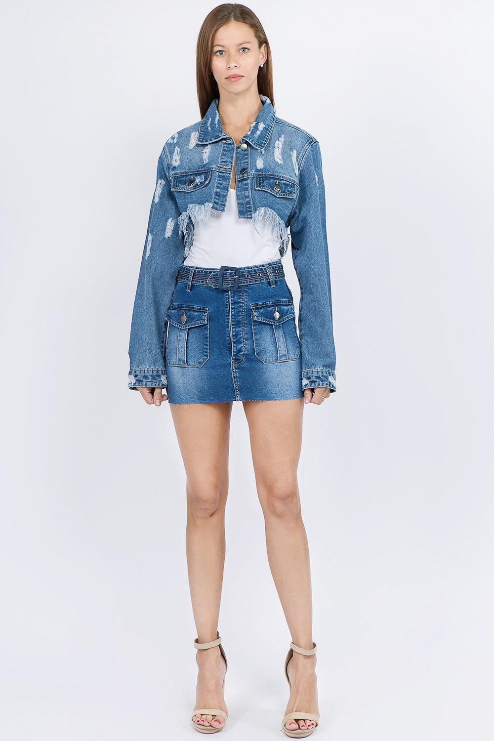 Distressed denim jacket with a frayed hem